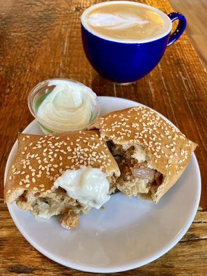 Knish filled with harissa, chickpeas and cauliflower served with garlic mayo. Cozyside Latte (cardamom and date)