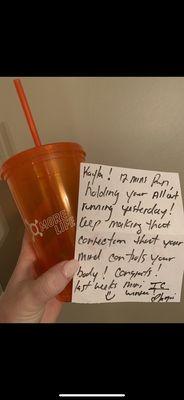 An OTF cup that I earned and a motivational note that one of the coaches wrote me after a huge personal goal I hit.