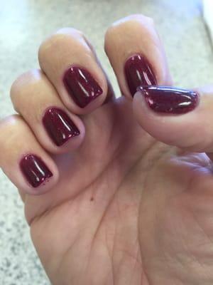 Beautiful deep red gel manicure.