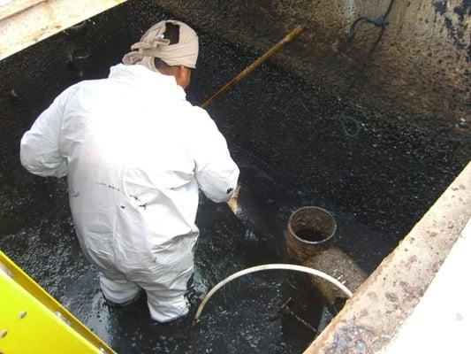 Oil-water separator cleaning and closure