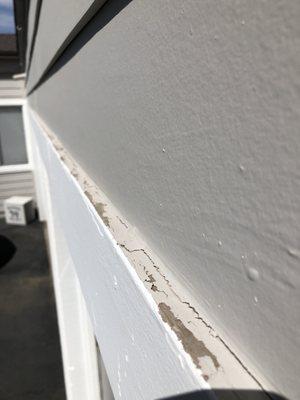 Top of trim NOT painted around entire house resulting in wood rot and water seepage.