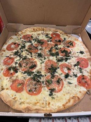 Spinach Pizza with Tomato and Sausage