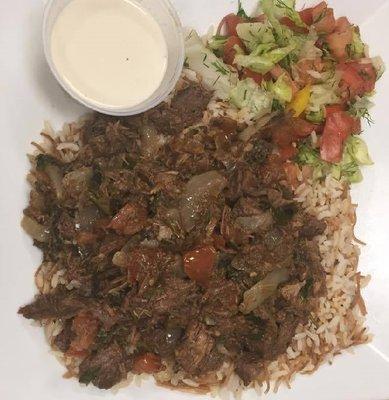 beef shawarma over rice, salad & tahina sauce