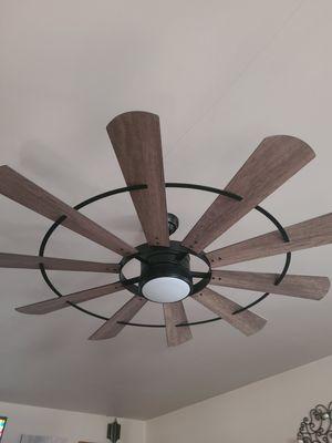 Installed this very nice living room fan with remote control for a client of ours.