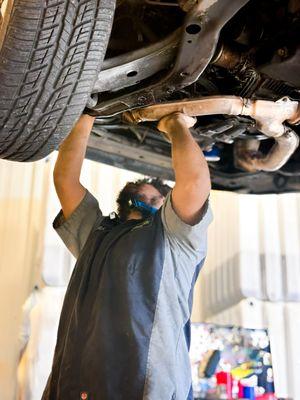 ASE technician working at Eurasian Auto Repair NE