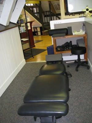 Open adjustment areas in our office. Pictured is a chiropractic "drop" table.