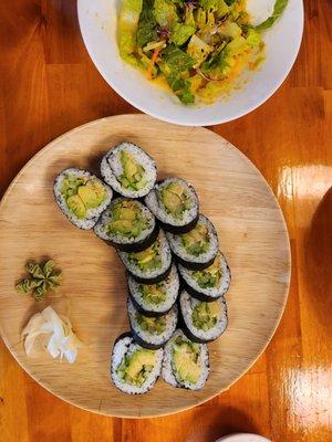 Avocado + cucumber rolls and small house salad.