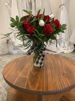 A dozen beautiful red roses with a pop of white for your valentine.