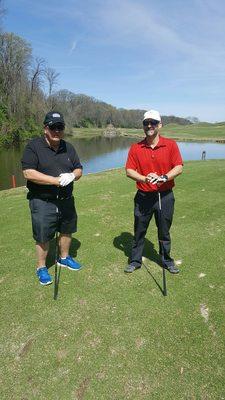 Enjoying a sunny day on the golf course.