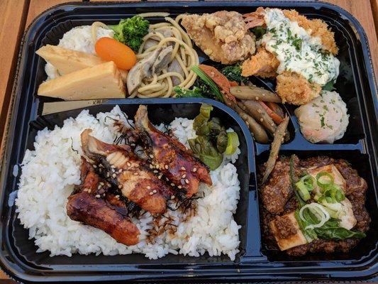 Amazing $15 "omakase bento" on their secret menu, order through their website form. You can specify the price point ($12 & above).