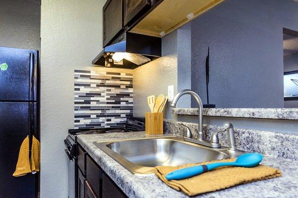 Kitchen area at Charleston Crossing apartments in Broken Arrow, Oklahoma.