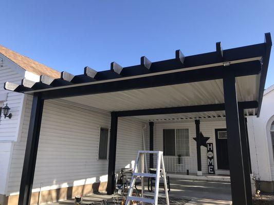 We painted the columns and beam black to match our house.