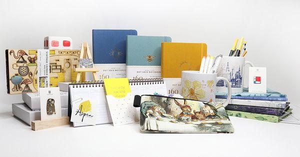 A collection of our items. Journals, Pins, Mugs, Pencil Pouches, Journals and more...