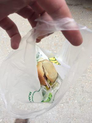 This is how my sandwich was handed to me after I was done being treated with awful customer service by Taylor.