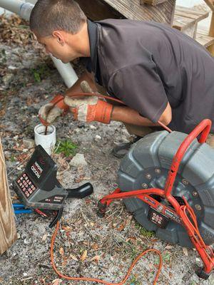 Brock using one of our Ridgid Sewer scopes to identify an issue with a leak on a sewer line.