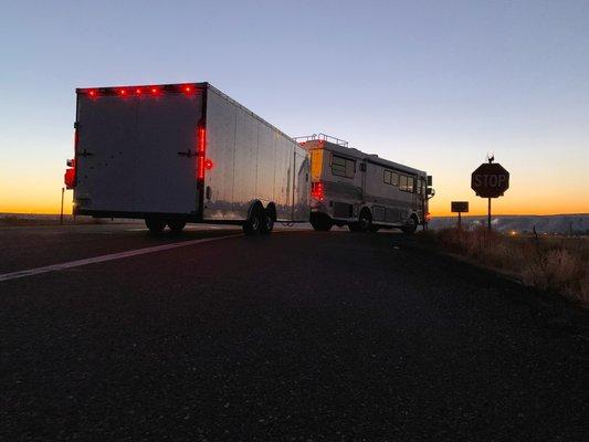 The Hawkins and car hauler somewhere in Nevada at sunset.