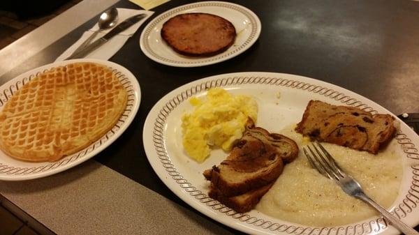 All Sar Special - Gruts, scrambled eggs, country ham, waffle, raisin tosst with apple butter and Coke.