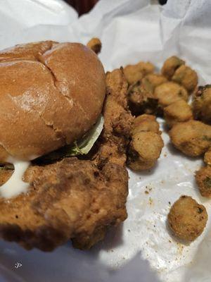 Chicken sandwich and fried okra which I've eaten most of the okra