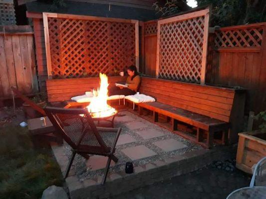 Wallingford backyard patio with planter benches using all repurposed materials.