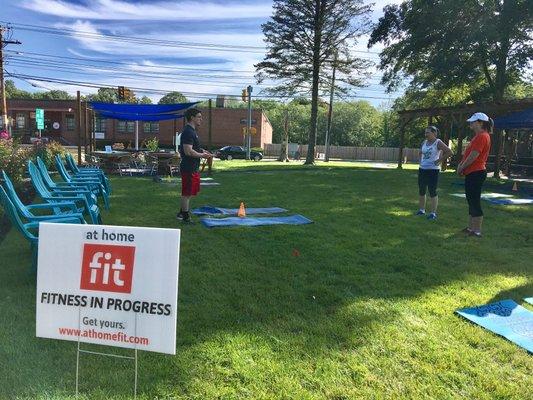 Head Trainer Kevin MacQueen explains an exercise during our Workout in the Park.