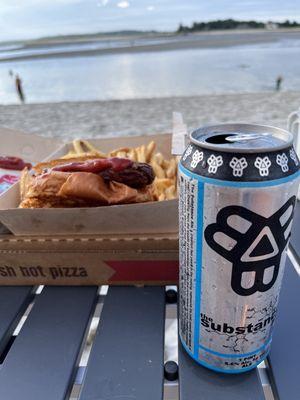 Hot dog basket and a local craft beer for the beach picnic