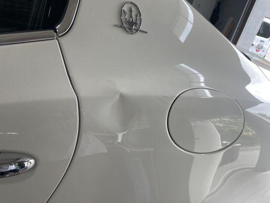 Before paintless dent repair