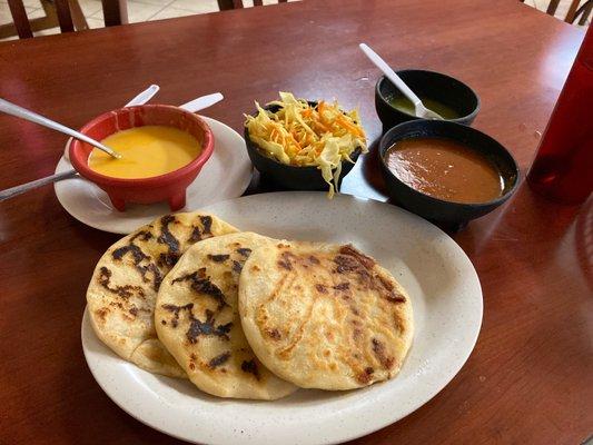 Chicken and pork and cheese pupusas. Side of Cabbage.