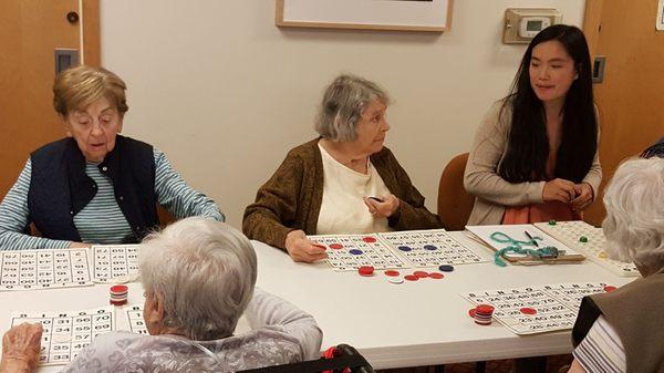 Residents enjoy playing bingo.