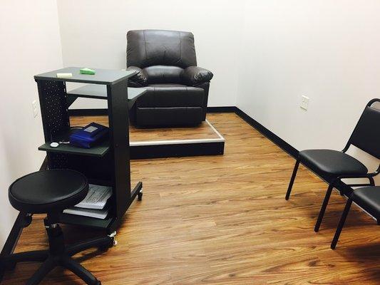 Comfortable chairs for our patients. This is just one of our three exam rooms