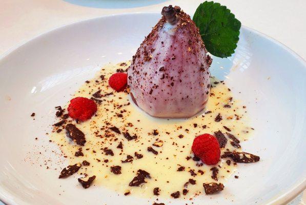 Poached truffle stuffed pear. It's a piece of Art. Get it, you won't regret even one bite of it.