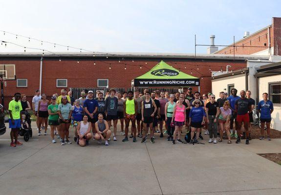 Running Niche Run Club meeting behind the store on a typical Wednesday night at 6:30PM. All paces are welcome at this weekly run/walk group.