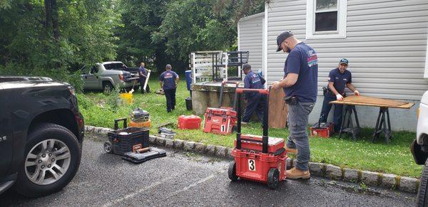 The AC crew setting up on a job site.