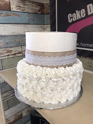 Two tier rustic wedding cake. Done by Cake Designer Merlena Elliot