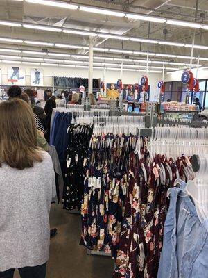 Line of 20+ people weaving through the clothes at 3pm on a Sunday...