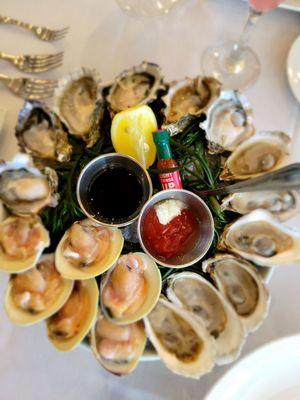 Clockwise : west coast , east coast oysters, clams