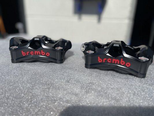 Side by side Brembo brake calipers