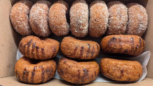 A box of cinnamon and maple drizzle donuts