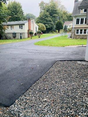 In front of shed area with crushed stone mixture.