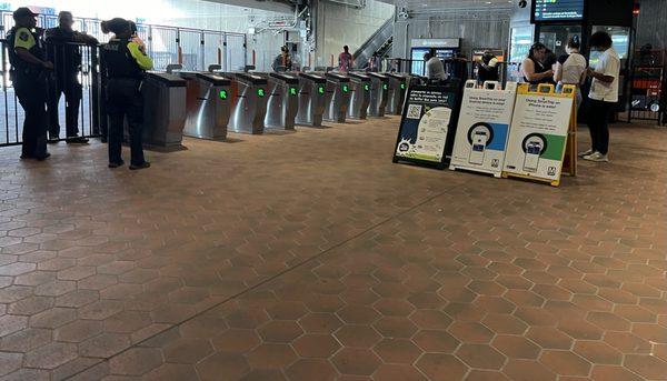 Four transit officers and two employees guarding the NEW gates. Waste of FEDERAL grant money on the gates!!