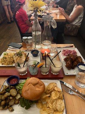 The roti wrap, wings and three pepper cheeseburger. I also got a frozen flight. Everything was delicious and service was fast!