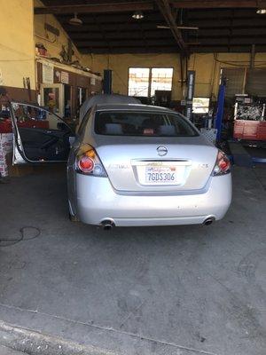 My car inside the shop.