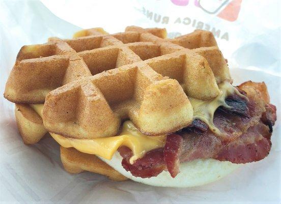 Belgian Waffle Breakfast Sandwich: maple sugar bacon, egg, American cheese, malted Belgian waffles