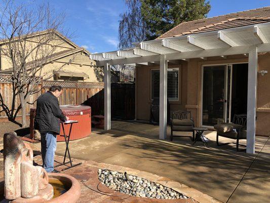 Steve's architect drawing up plans for a room addition. Steve's services don't stop for you just because we closed escrow.