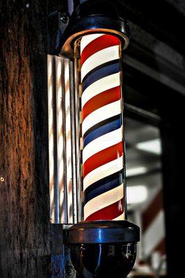 Classic Barber Pole outside makes the place both welcoming and recognizable