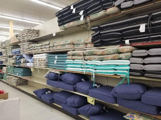 Lots of out door furniture cushions and pillows in stock