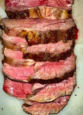 28 day aged prime rib cooked to perfection in a bed of rock salt for incredible flavor