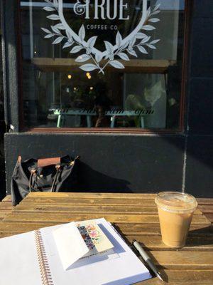 Oat milk latte on the patio in downtown Corvallis.