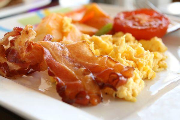 Hearty Breakfast Combo Scrambled Eggs, Bacon, Home Fries and Rustic Breads!