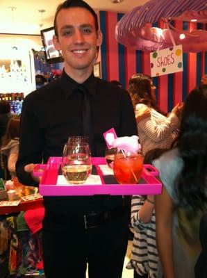 BD staff handing out drinks for an event at Dylans Candy Bar