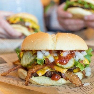 DOUBLE BACON BURGER Bacon (4 pcs.), Yellow American Cheese, Topped "Our Way"